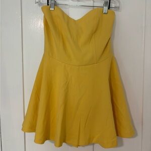 Strapless yellow skater dress/skort. Never been worn